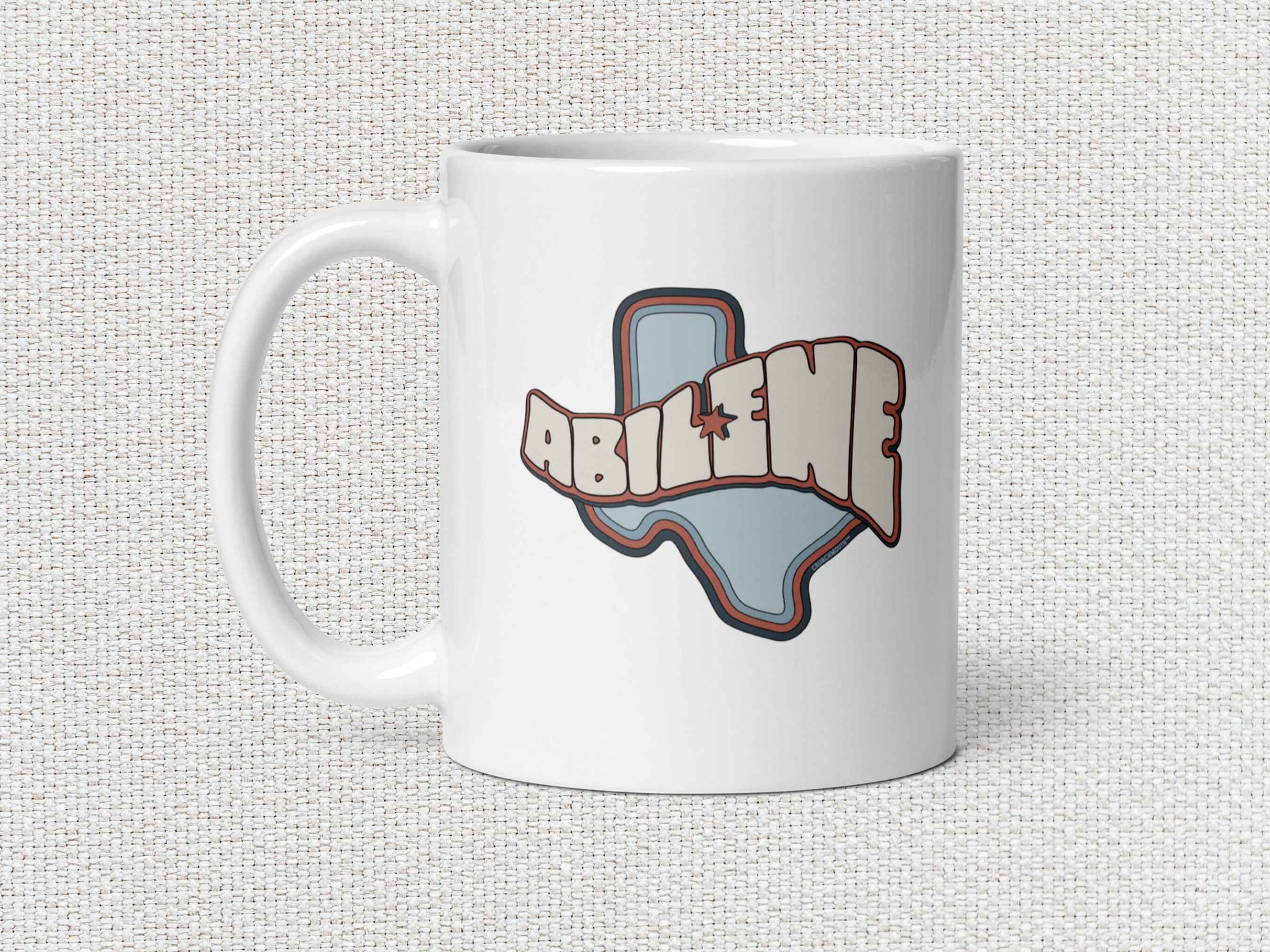 abilene coffee mug, 11oz, handle on left, white textured background