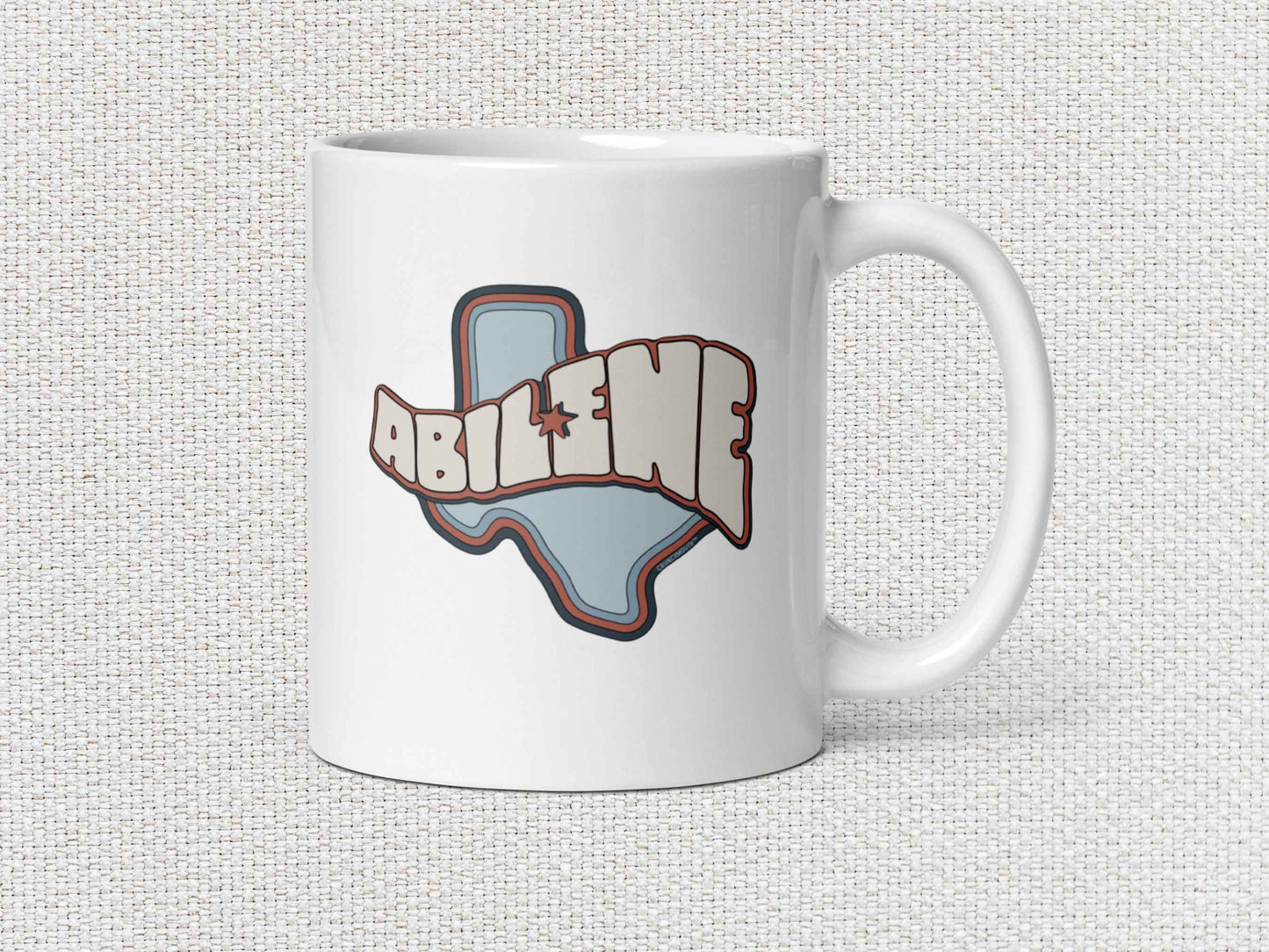 abilene coffee mug, 11oz, handle on right, white textured background