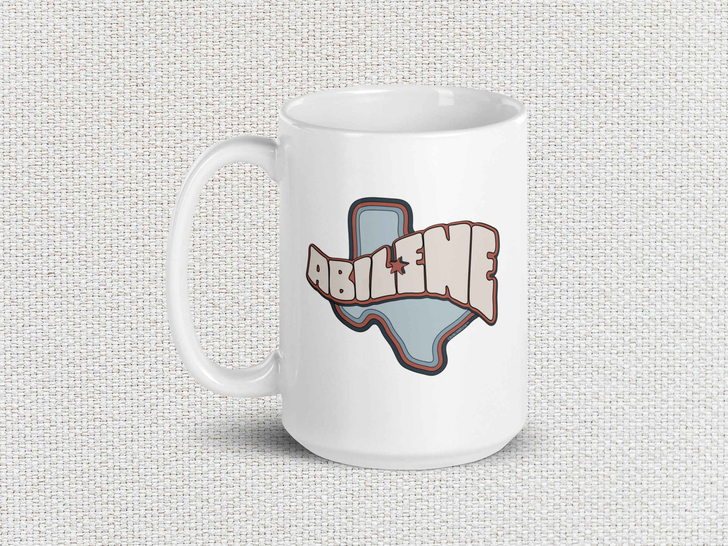 abilene coffee mug, 15oz, handle on left, white textured background