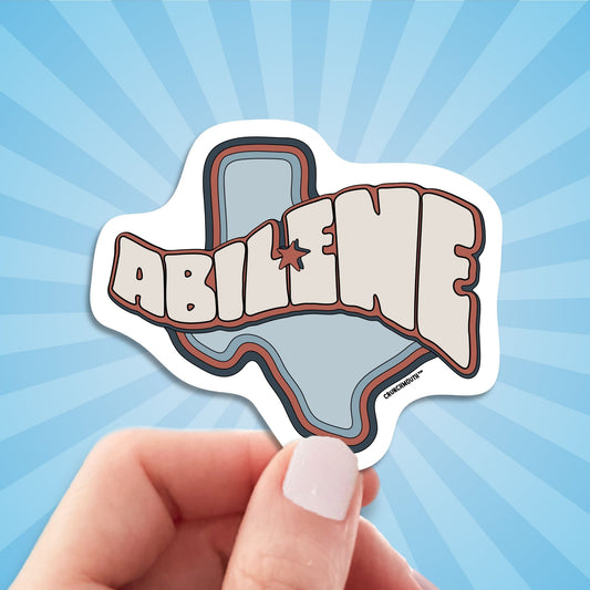 Abilene travel luggage sticker, hand display, sun rays design background
