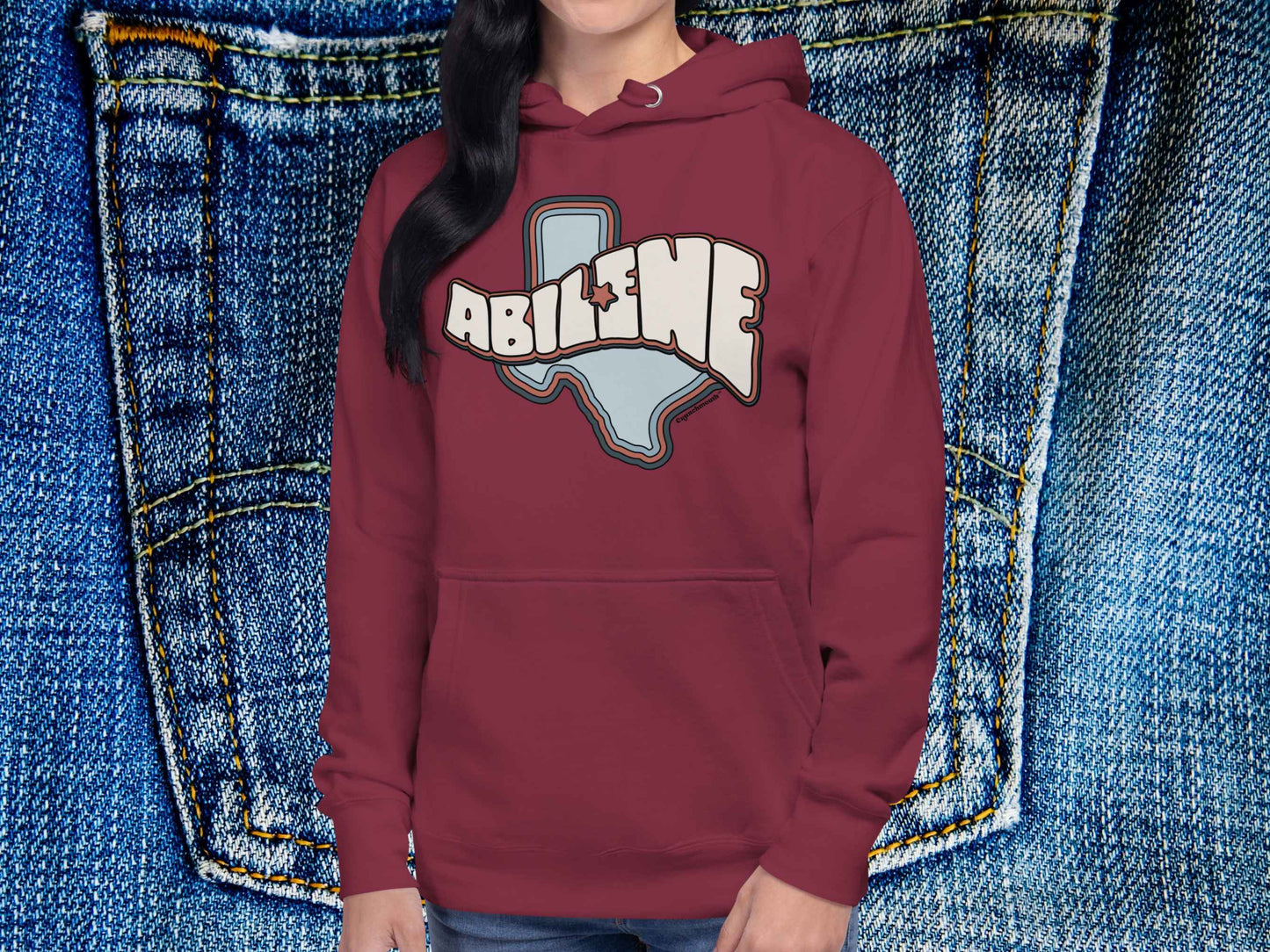 abilene tx hoodie, retro hoodied sweatshirts, female model, front, blue jeans background