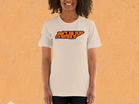 tennessee shirt, ain't no place i'd rather be, female model, front, orange textured background