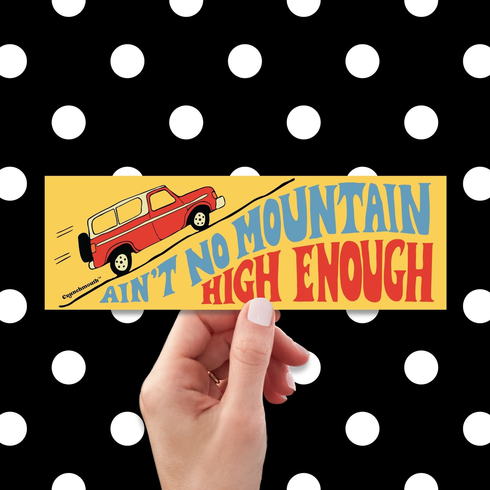 aint no mountain high enough bumper sticker, hand display, polka dots pattern design background