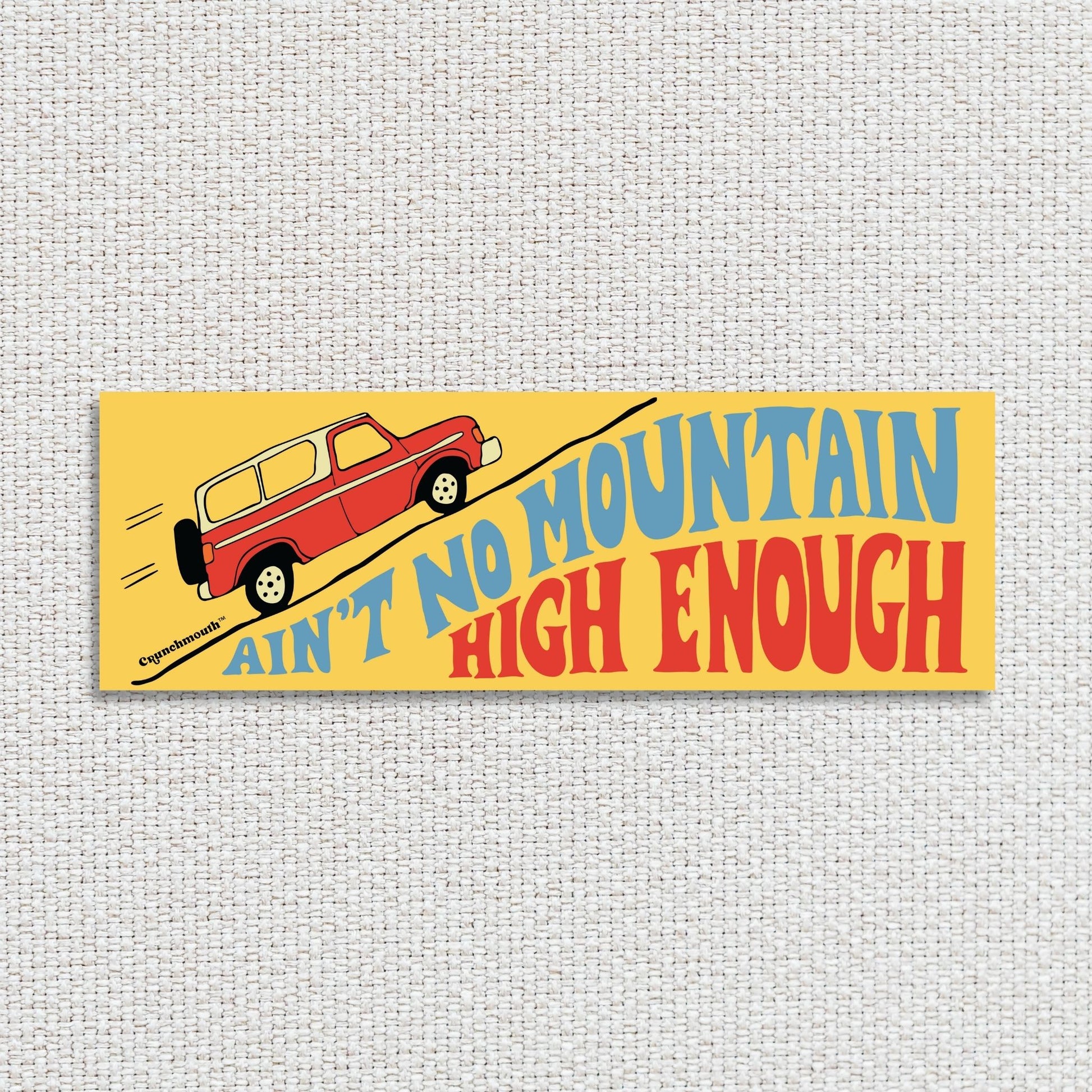 aint no mountain high enough bumper sticker, textured fabric background