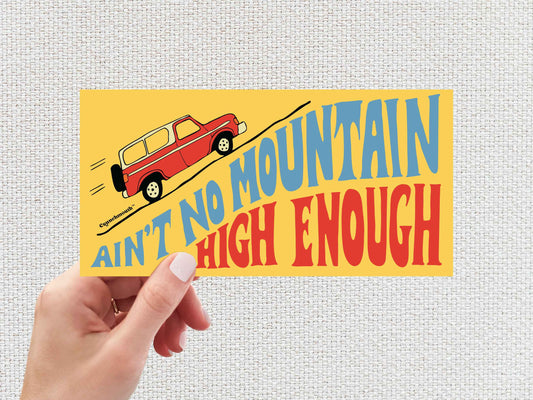 aint no mountain high enough bumper sticker, hand display, white textured background