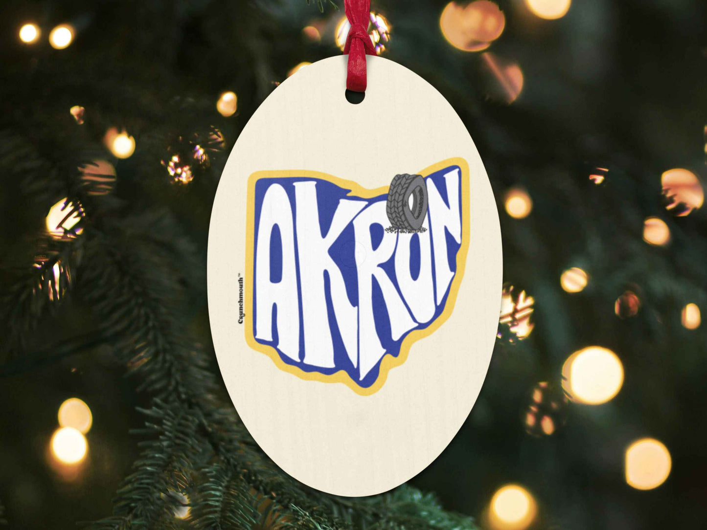 akron Christmas ornament, back, Christmas tree background