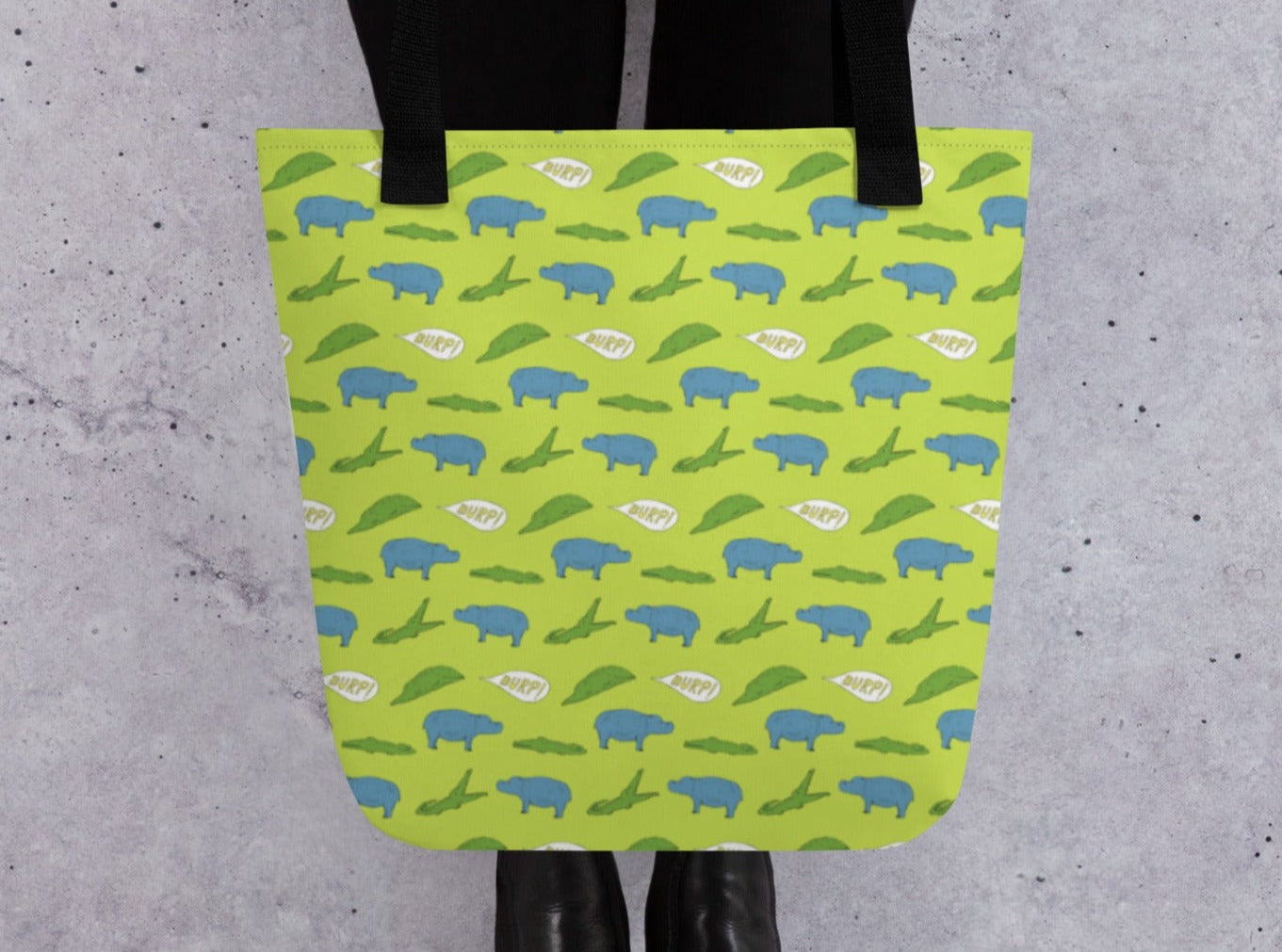 alligator eating hippo pattern tote bag, burp, held, on light background