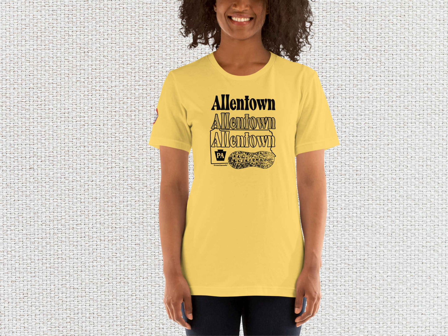 allentown peanut city shirt, female model, front, white textured background