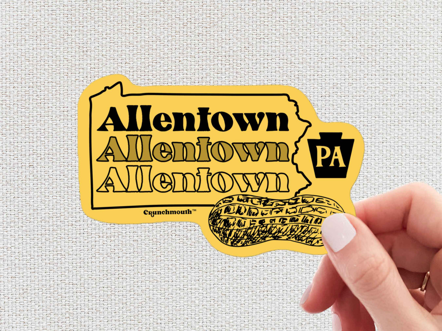 allentown sticker, peanut city, hand display, white textured background