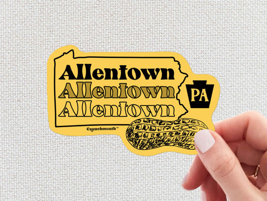 allentown sticker, peanut city, hand display, white textured background