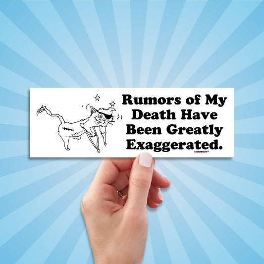 rumors of my death have been greatly exaggerated bumper sticker, hand display, sun rays design background
