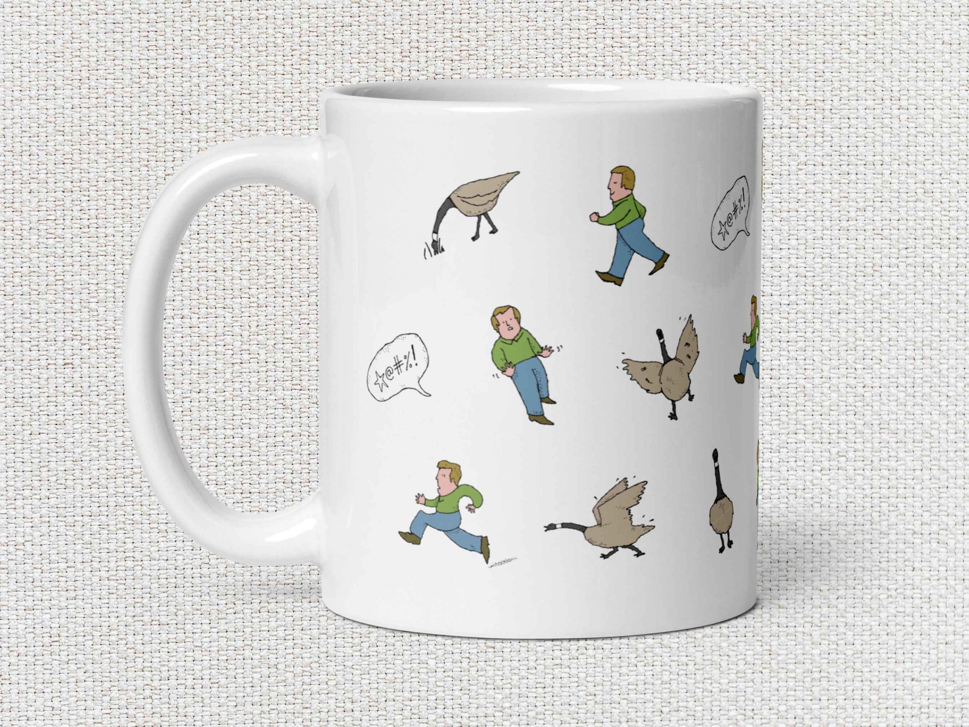 angry canada goose chases man coffee mug, 11oz, handle on left, white textured background