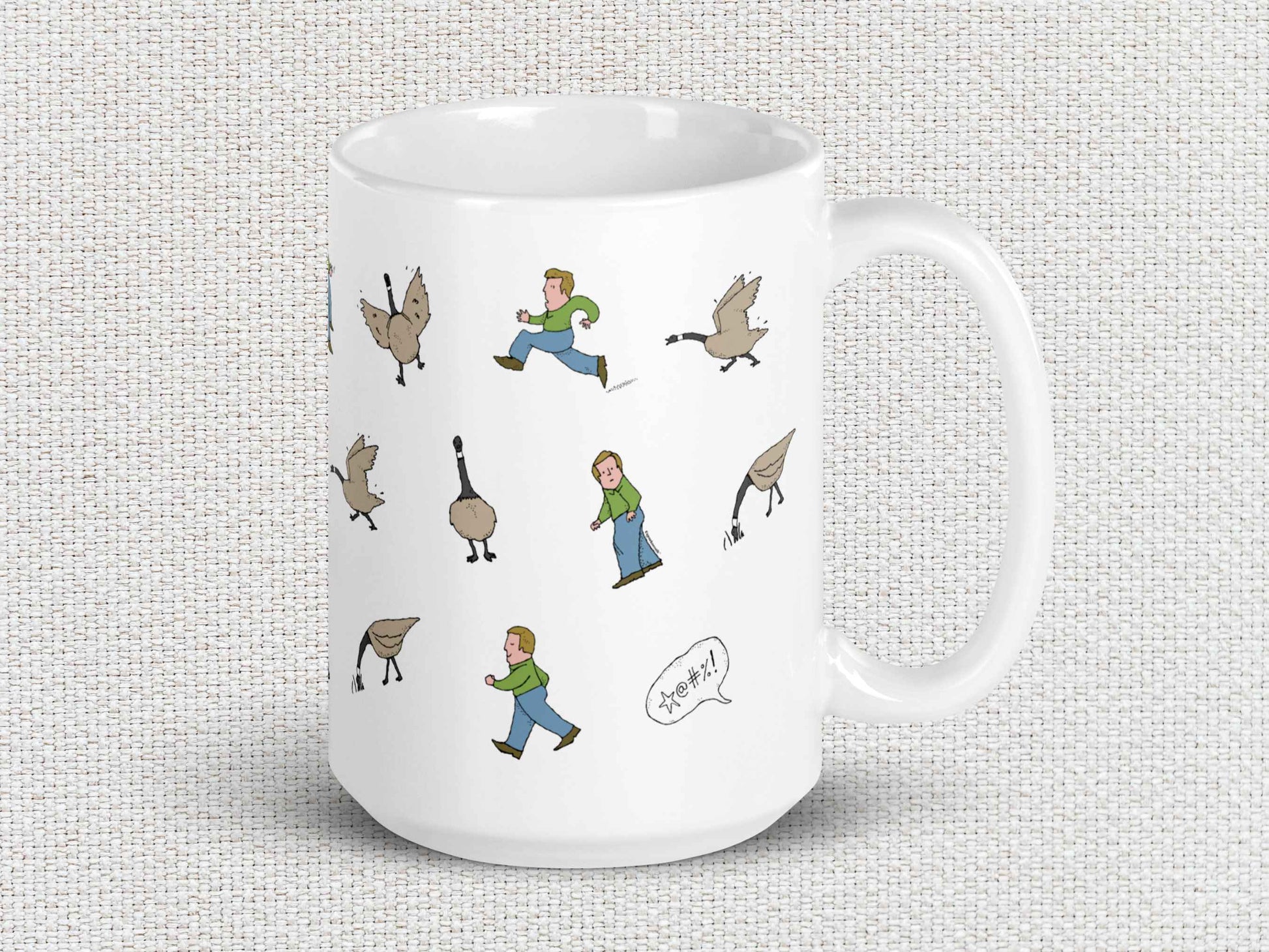 angry canada goose chases man coffee mug, 15oz, handle on right, white textured background