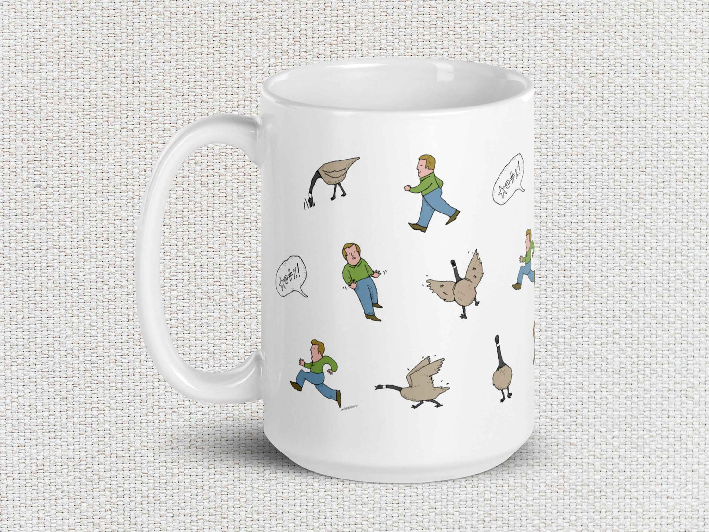 angry canada goose chases man coffee mug, 15oz, handle on left, white textured background