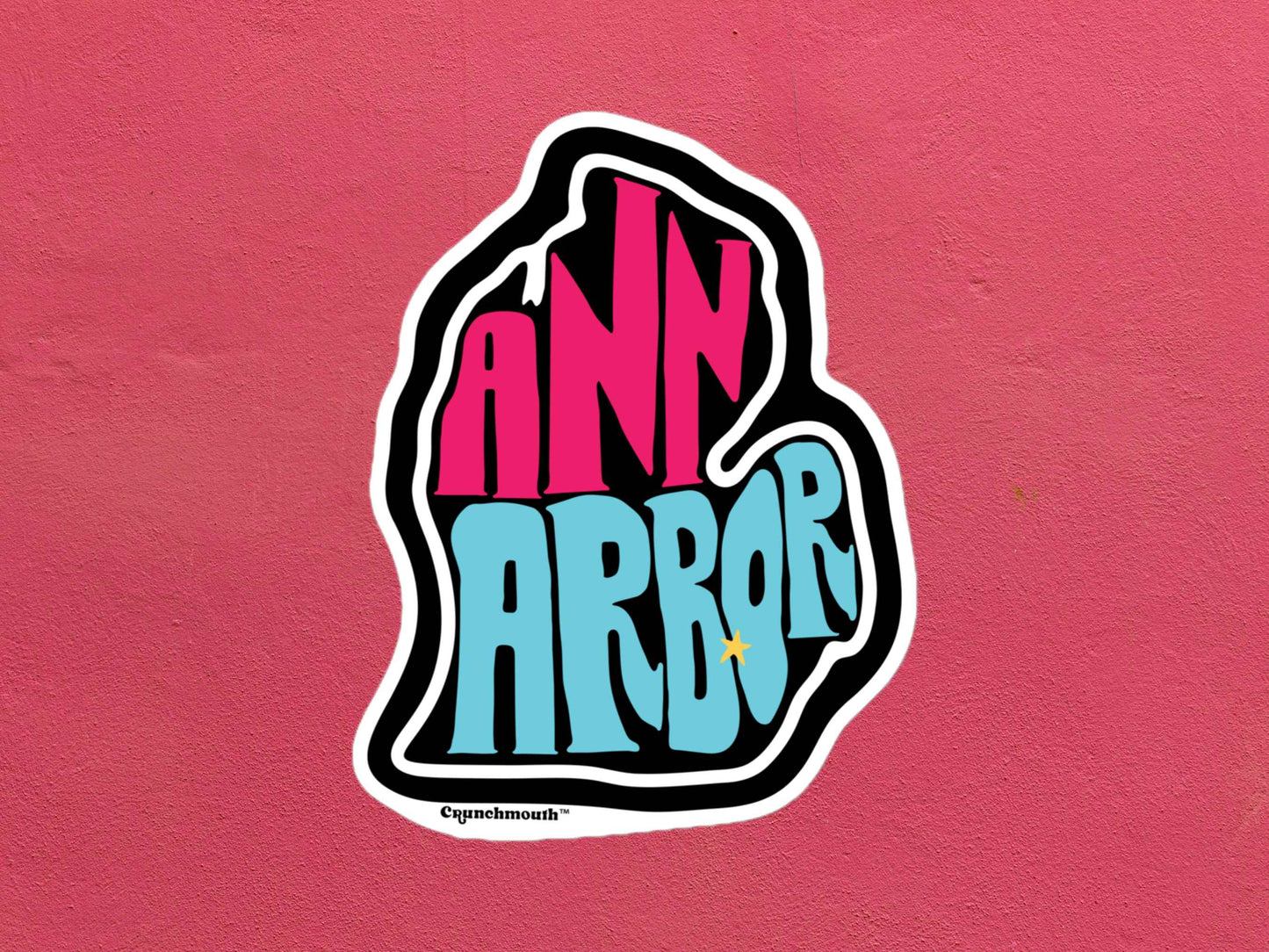 ann arbor sticker, rose color textured background