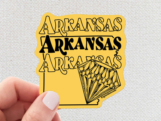 arkansas sticker, travel luggage stickers, hand display, white textured background