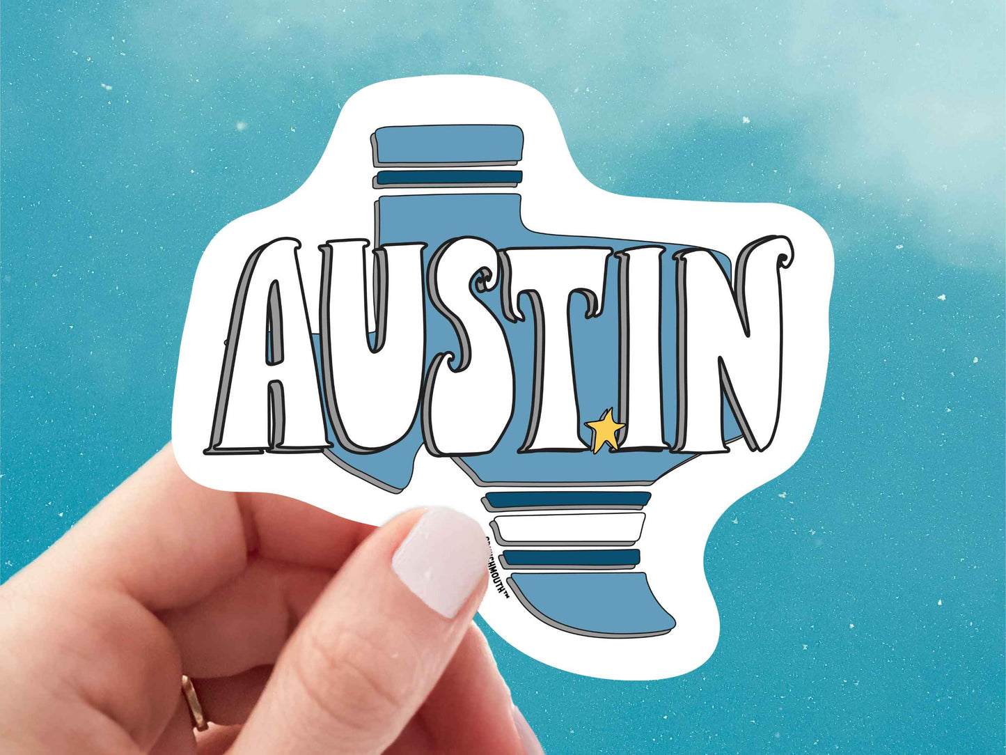 austin sticker, hand display, blue sky background