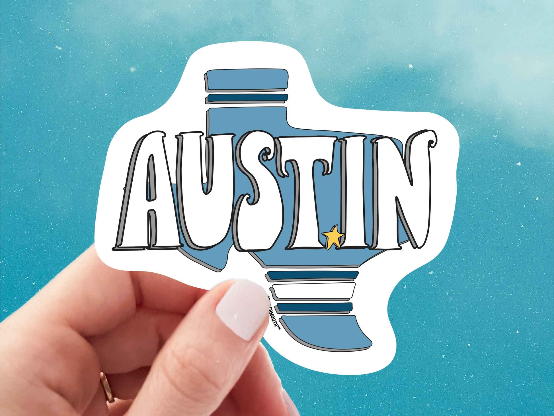 austin sticker, hand display, blue sky background