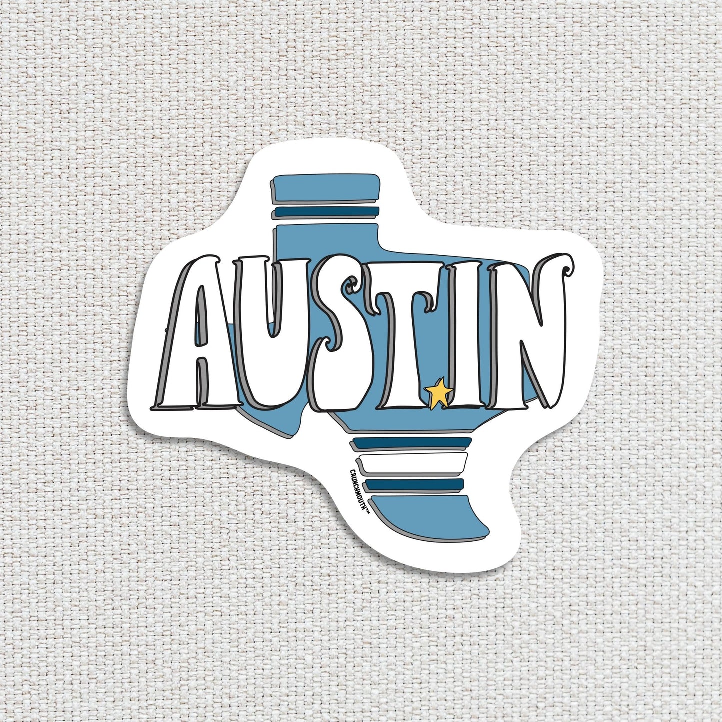 austin travel luggage sticker, hand display, white textured fabric background