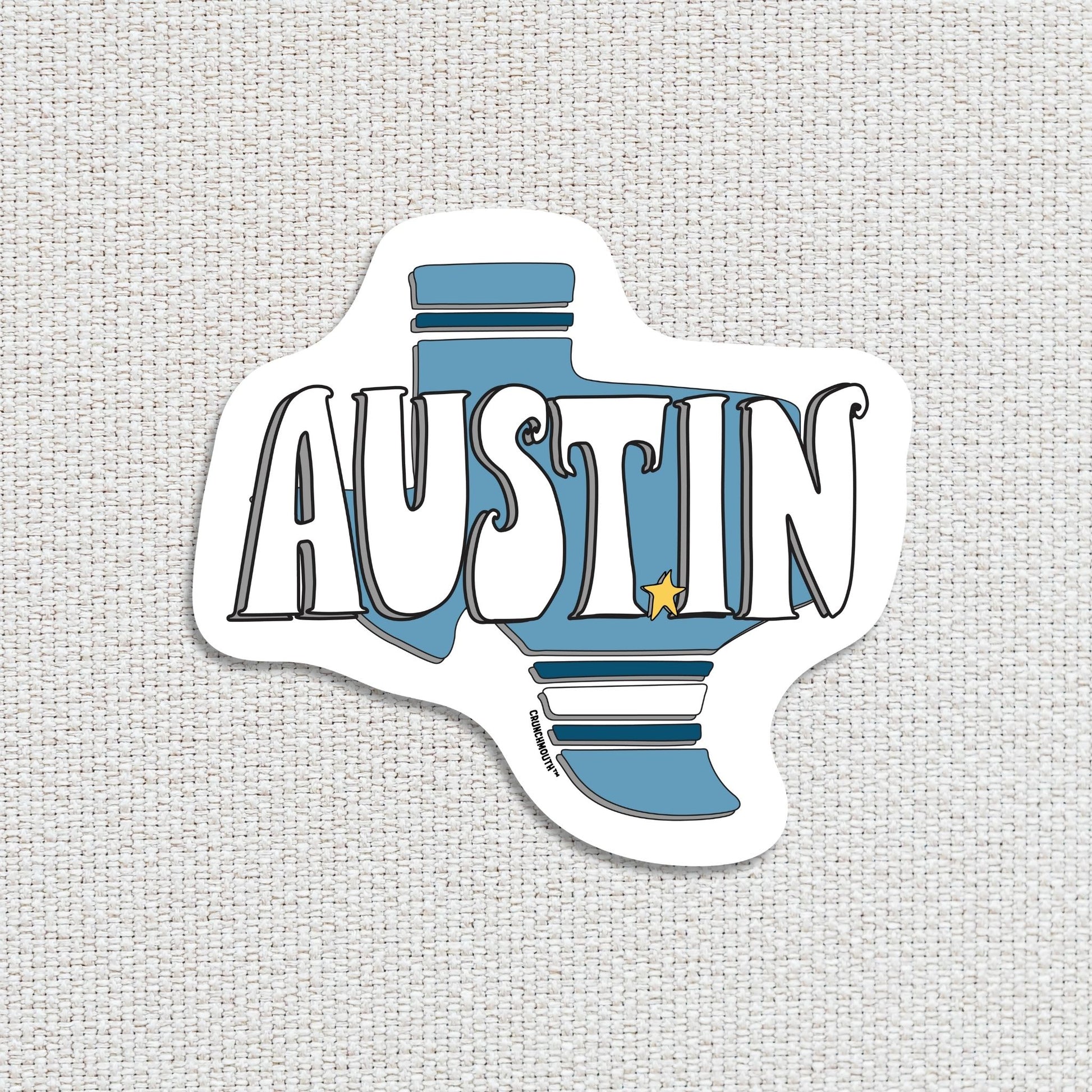 austin travel luggage sticker, hand display, white textured fabric background