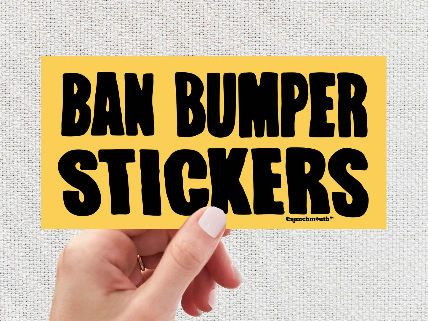 ban bumper stickers, funny bumper stickers, hand display, white textured background