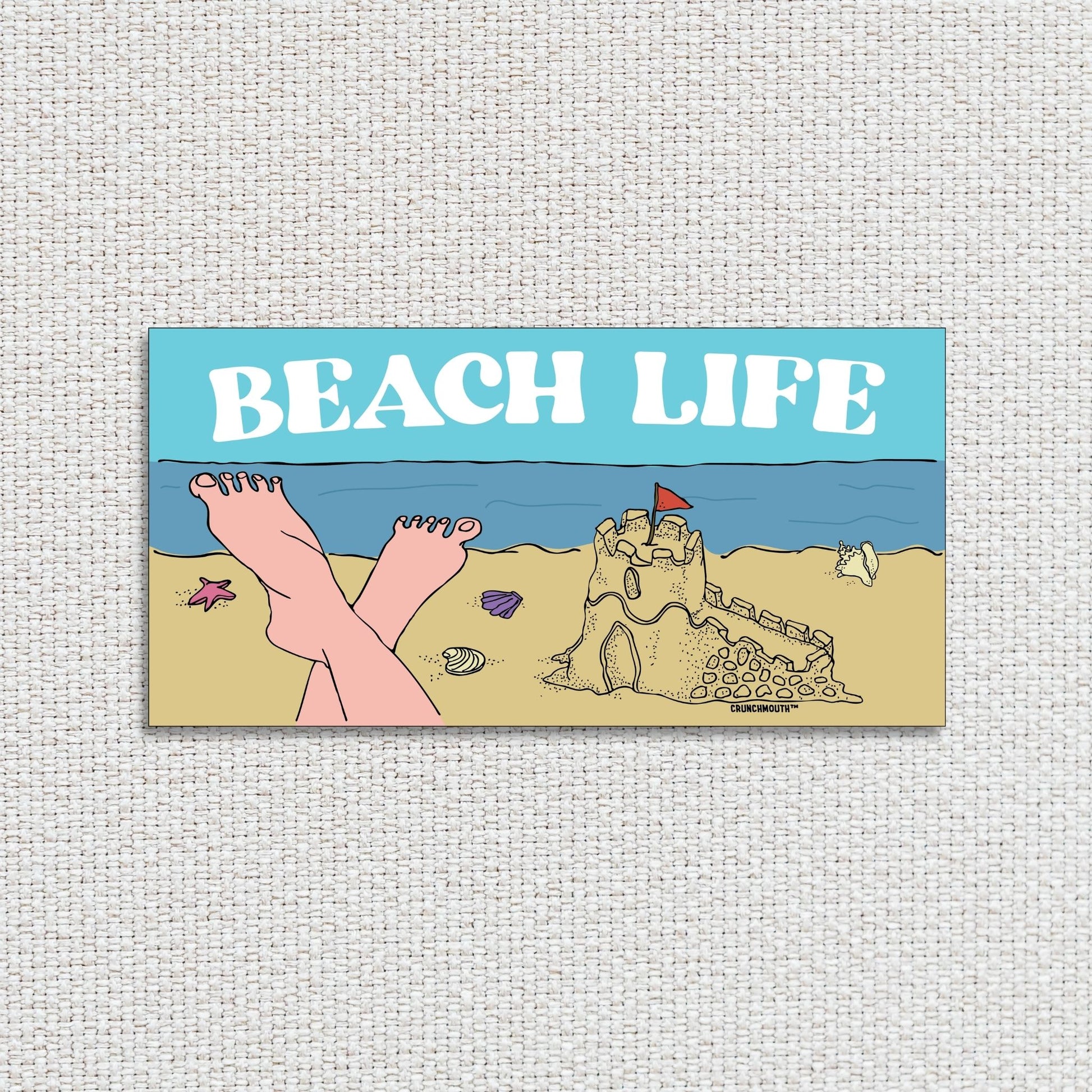 beach life bumper sticker, textured fabric background
