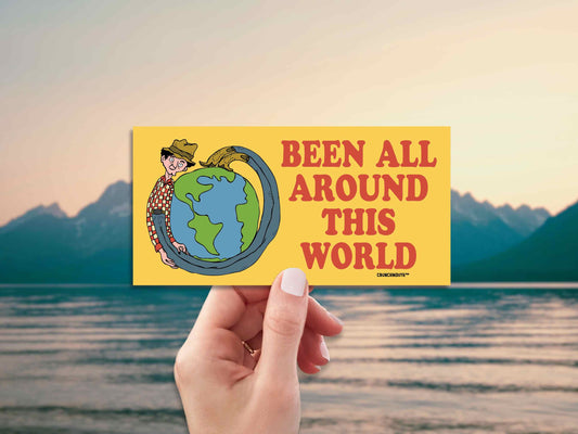 been all around this world bumper sticker, hand display, water landscape background