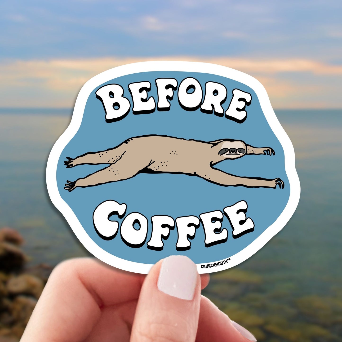 before coffee sloth sticker, hand display, lake erie background