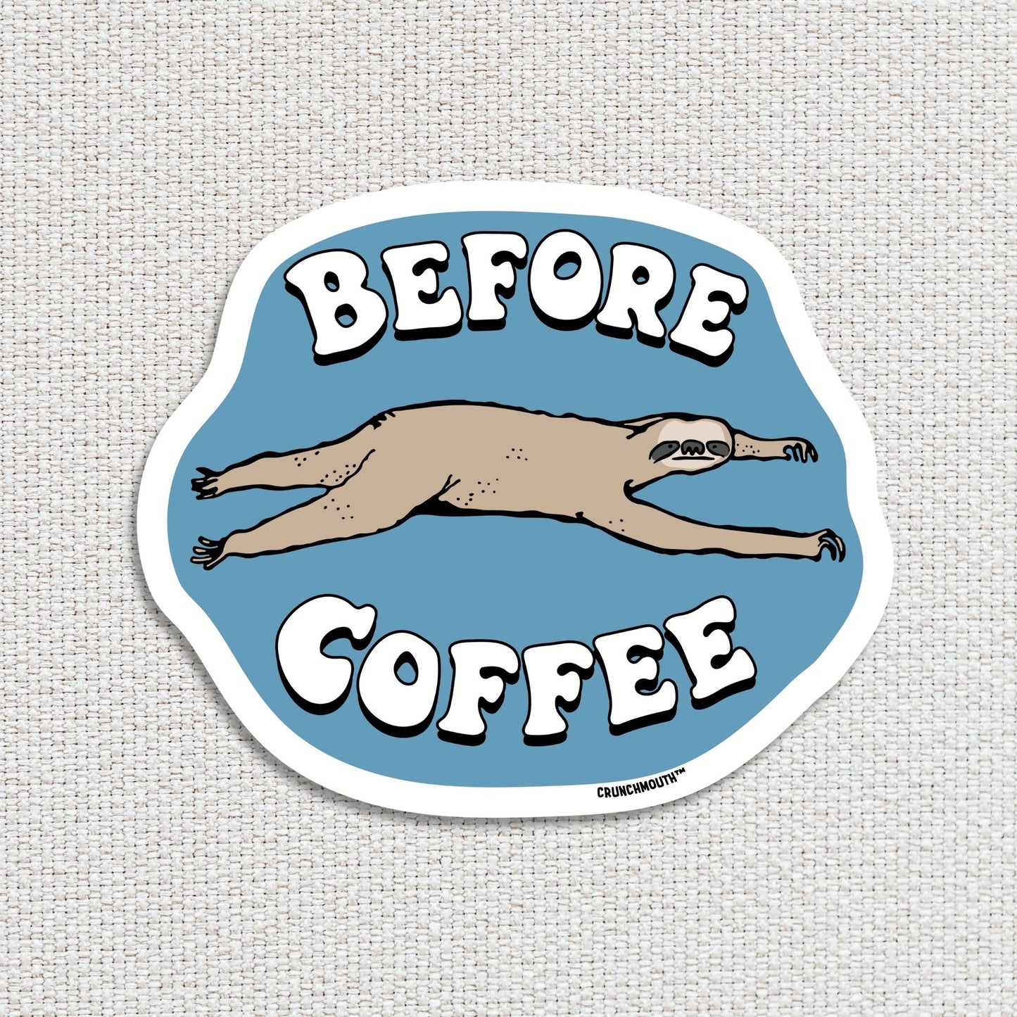 before coffee sloth sticker, white textured fabric background