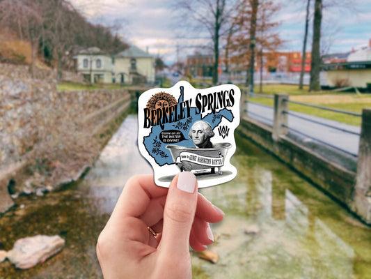 berkeley springs travel luggage sticker, hand display, landscape background