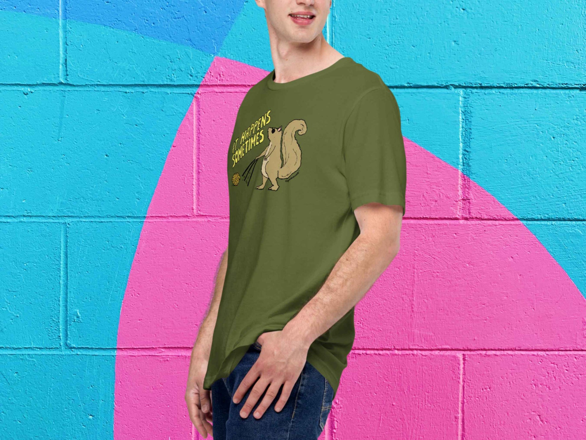 blind squirrel shirt, funny squirrel shirts, male model, front left angle, vibrant color cinder block wall background