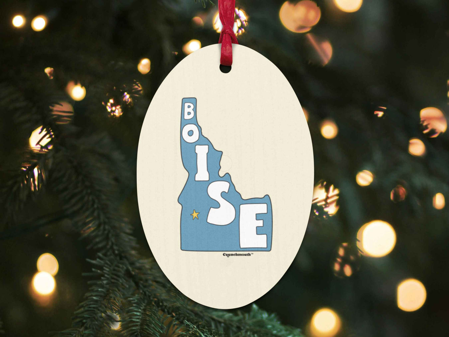 boise Christmas ornament, back, Christmas tree background