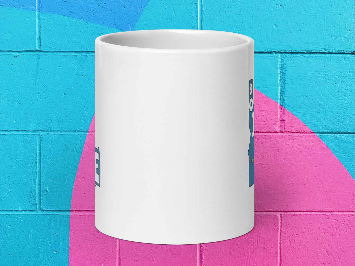 boise mug, souvenir coffee mugs, 20 oz, front view, vibrant color cinder block wall background