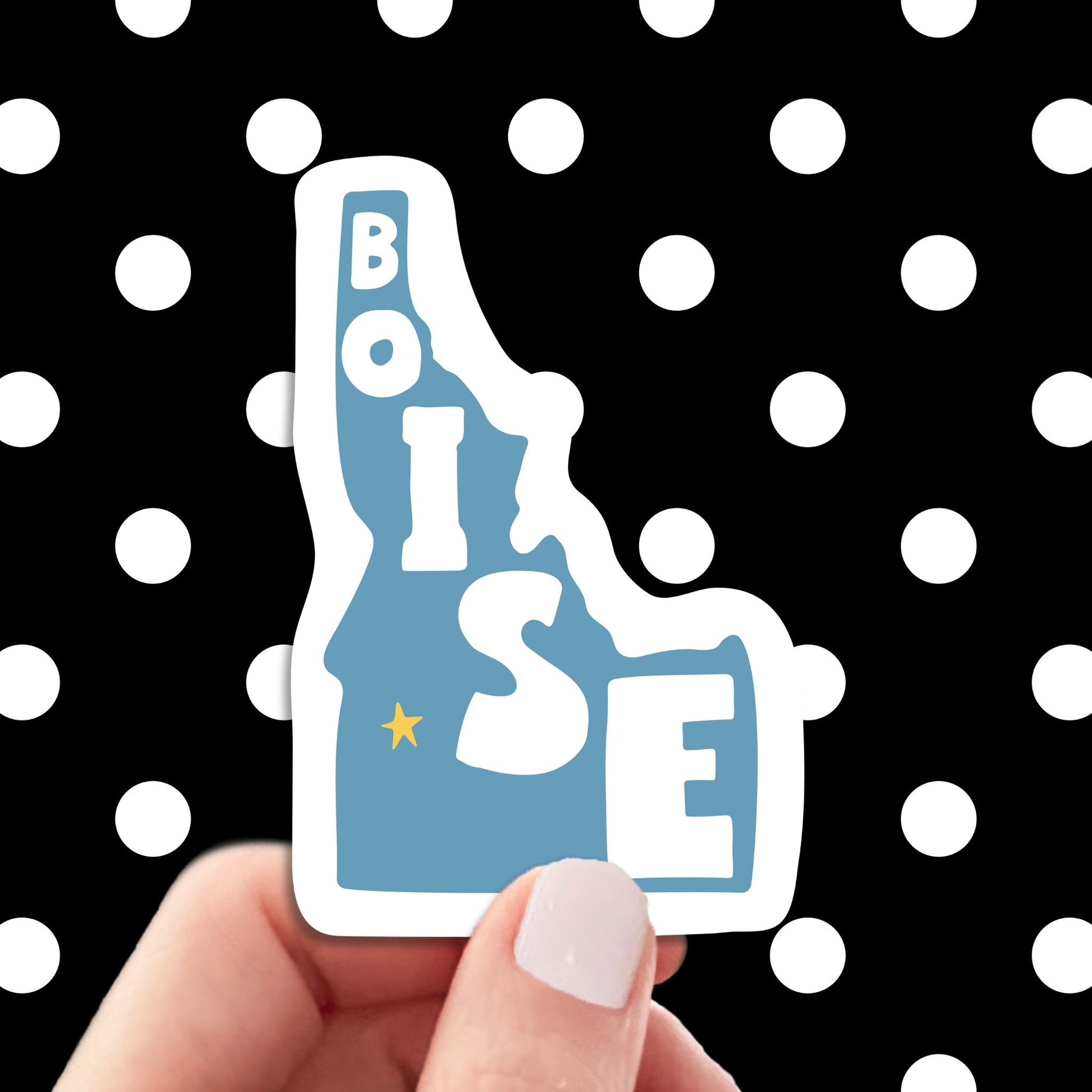 boise travel luggage sticker, hand display, polka dots pattern design background
