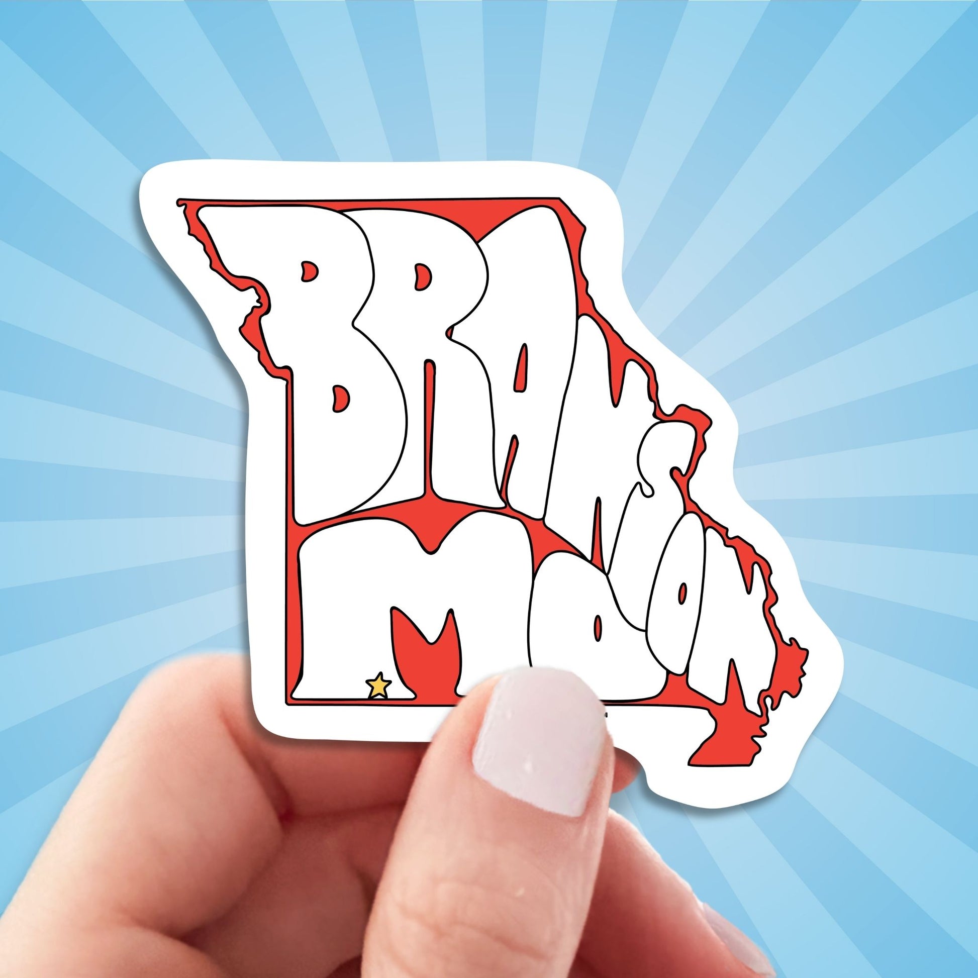 branson travel luggage sticker, hand display, sun rays design background
