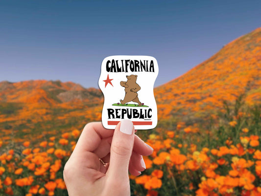 california republic bear travel luggage sticker, hand display, poppy background