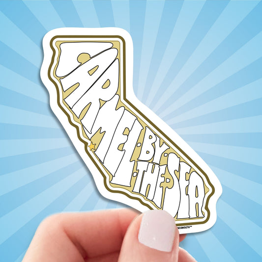 carmel by the sea travel luggage sticker, hand display, sun rays design background