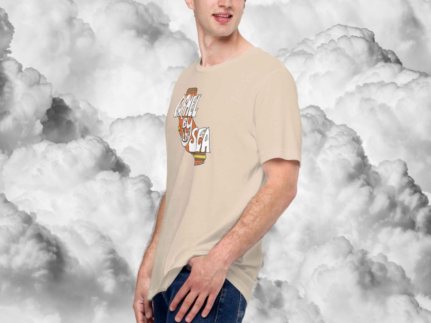 carmel by the sea shirt, souvenir t shirts, front left side, male model, white clouds background