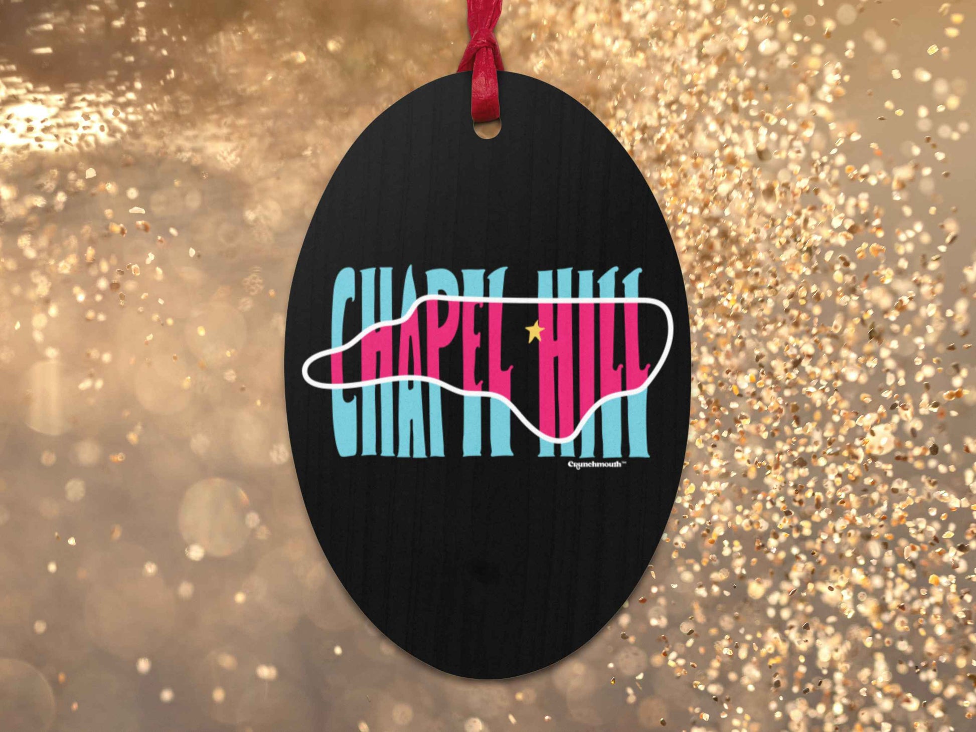 chapel hill Christmas ornament, back, gold glitter background