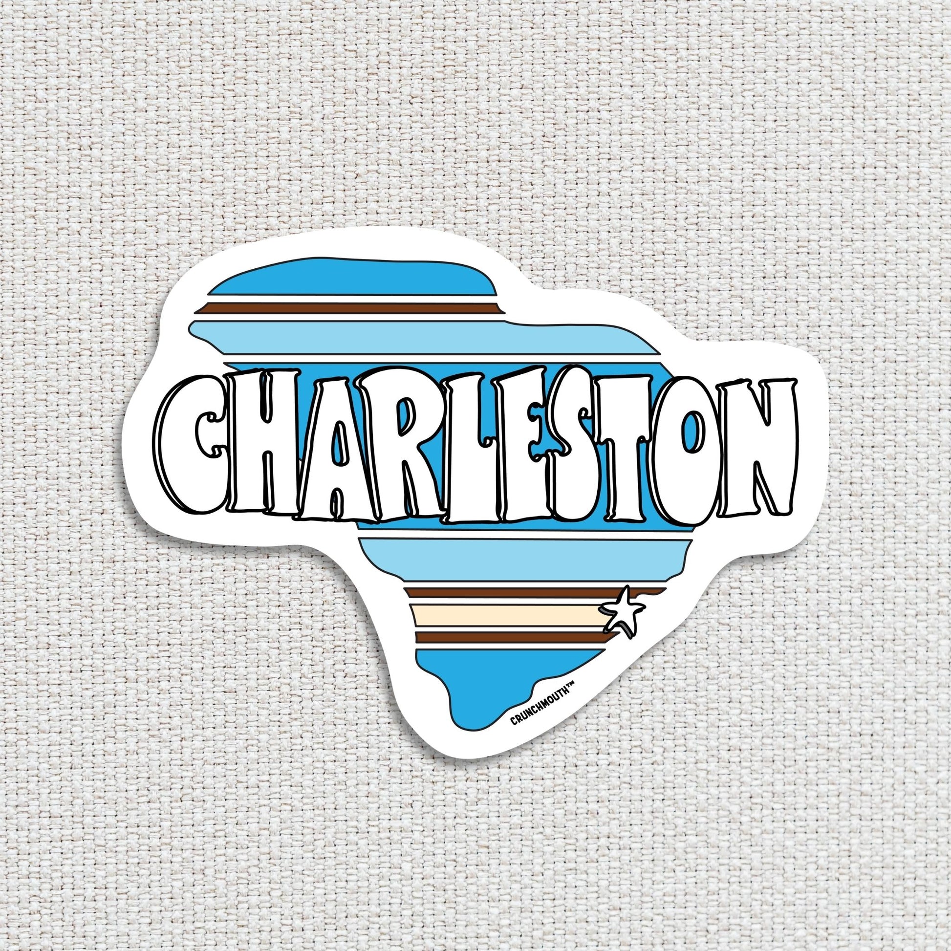 charleston travel luggage sticker, textured fabric background
