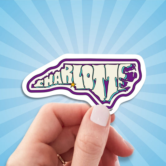 charlotte travel luggage sticker, hand display, sun rays design background
