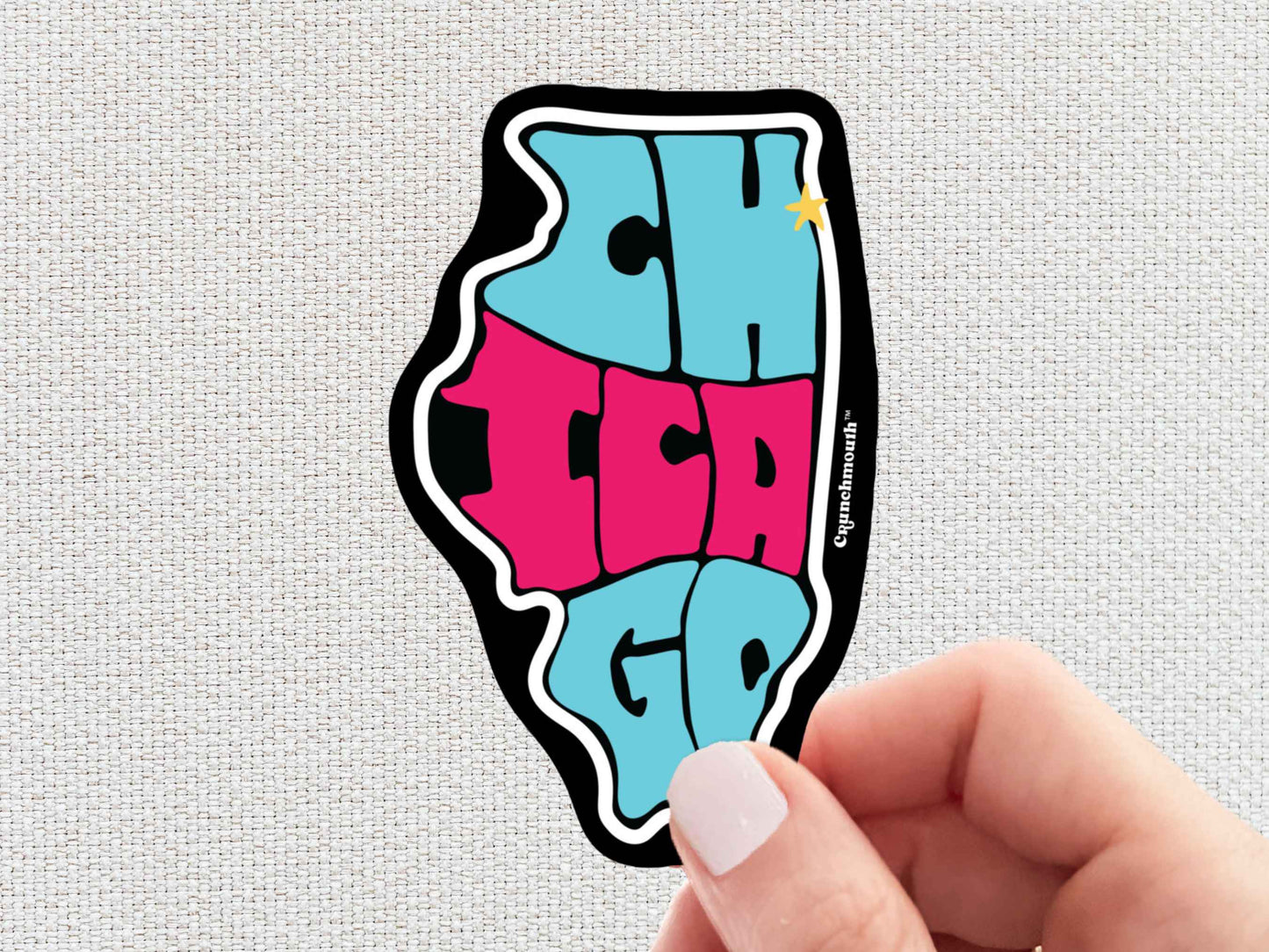 chicago sticker, hand display, white textured background