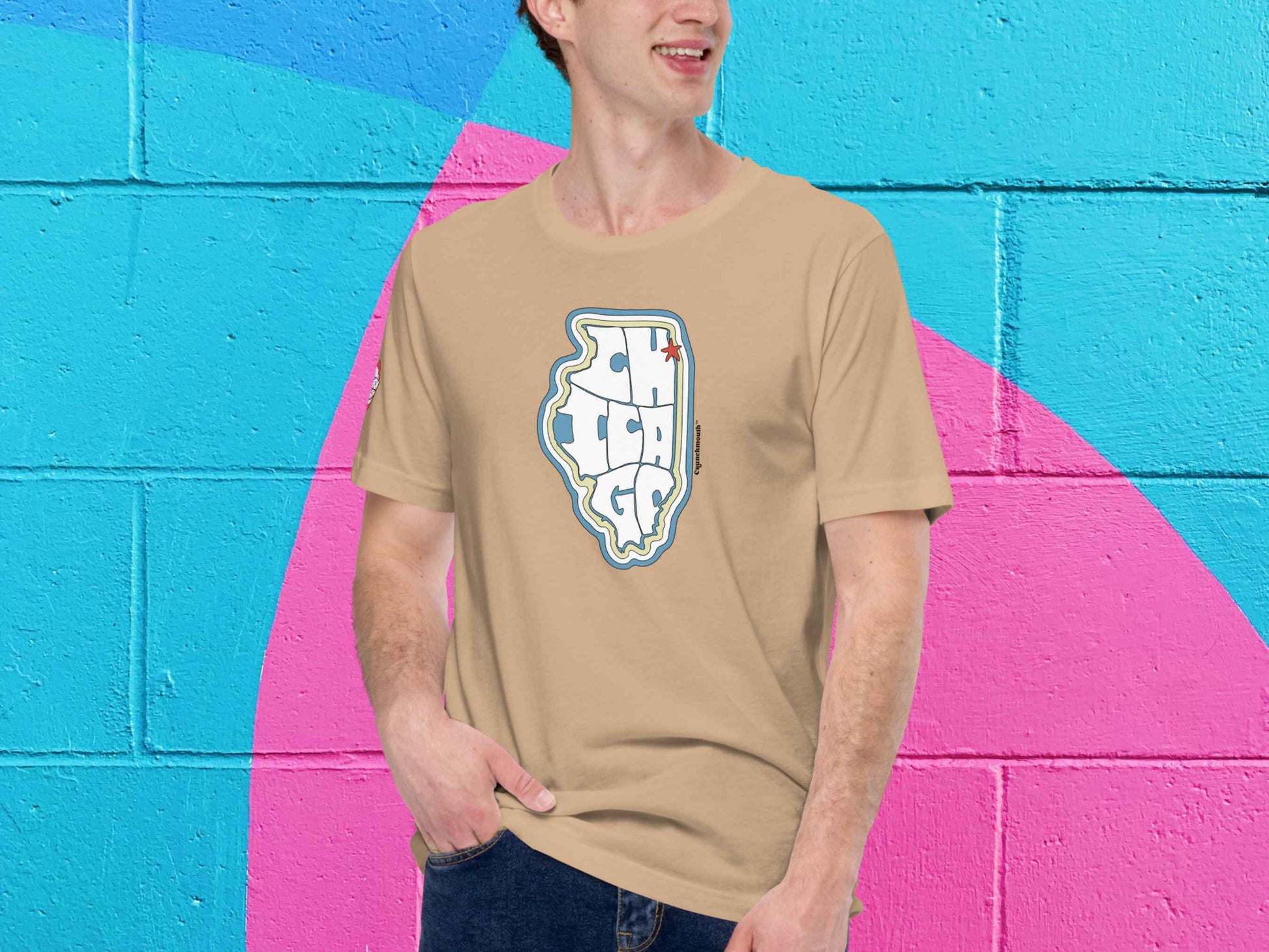 chicago tshirt, retro t shirts, male model, front, vibrant color cinder block wall background