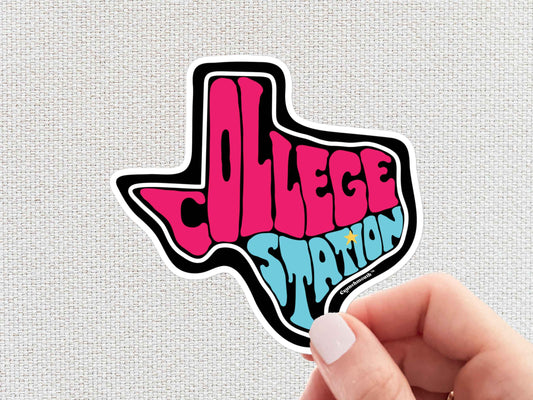 college station sticker, hand display, white textured background