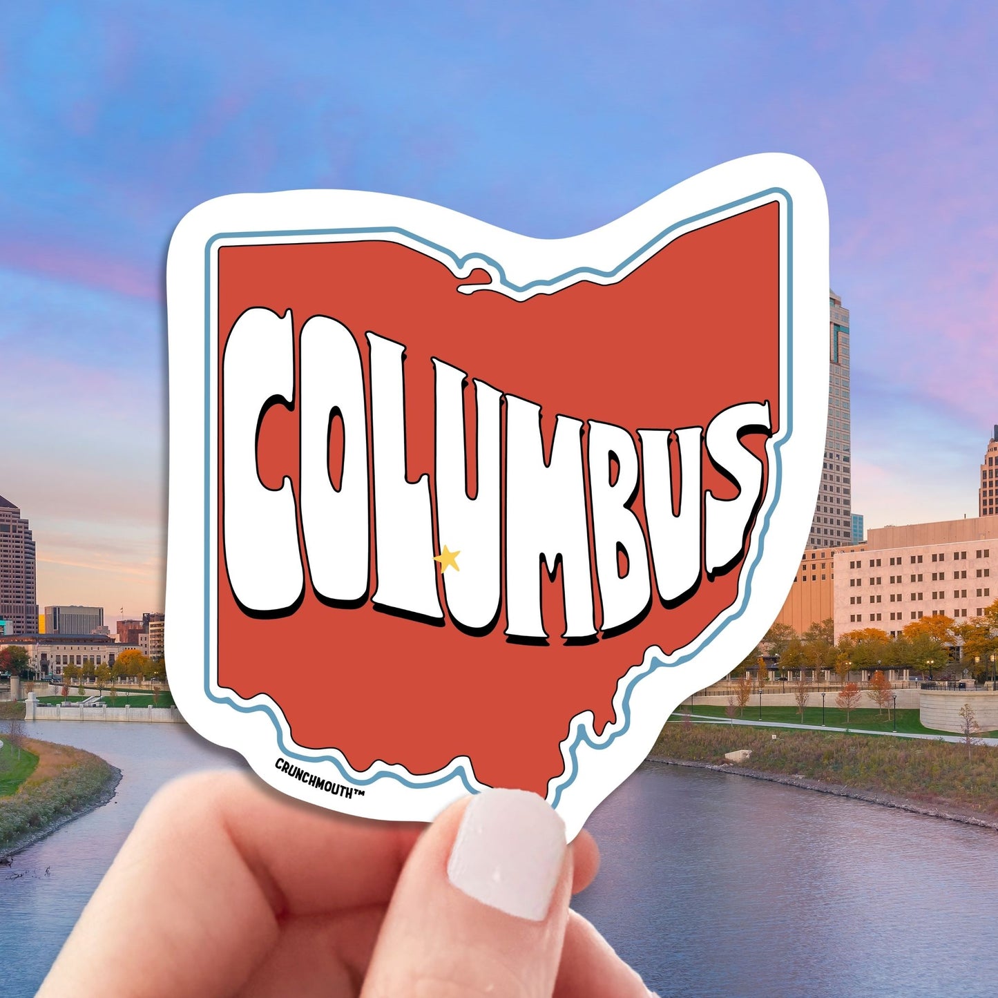 columbus ohio travel luggage sticker, hand display, cityscape background