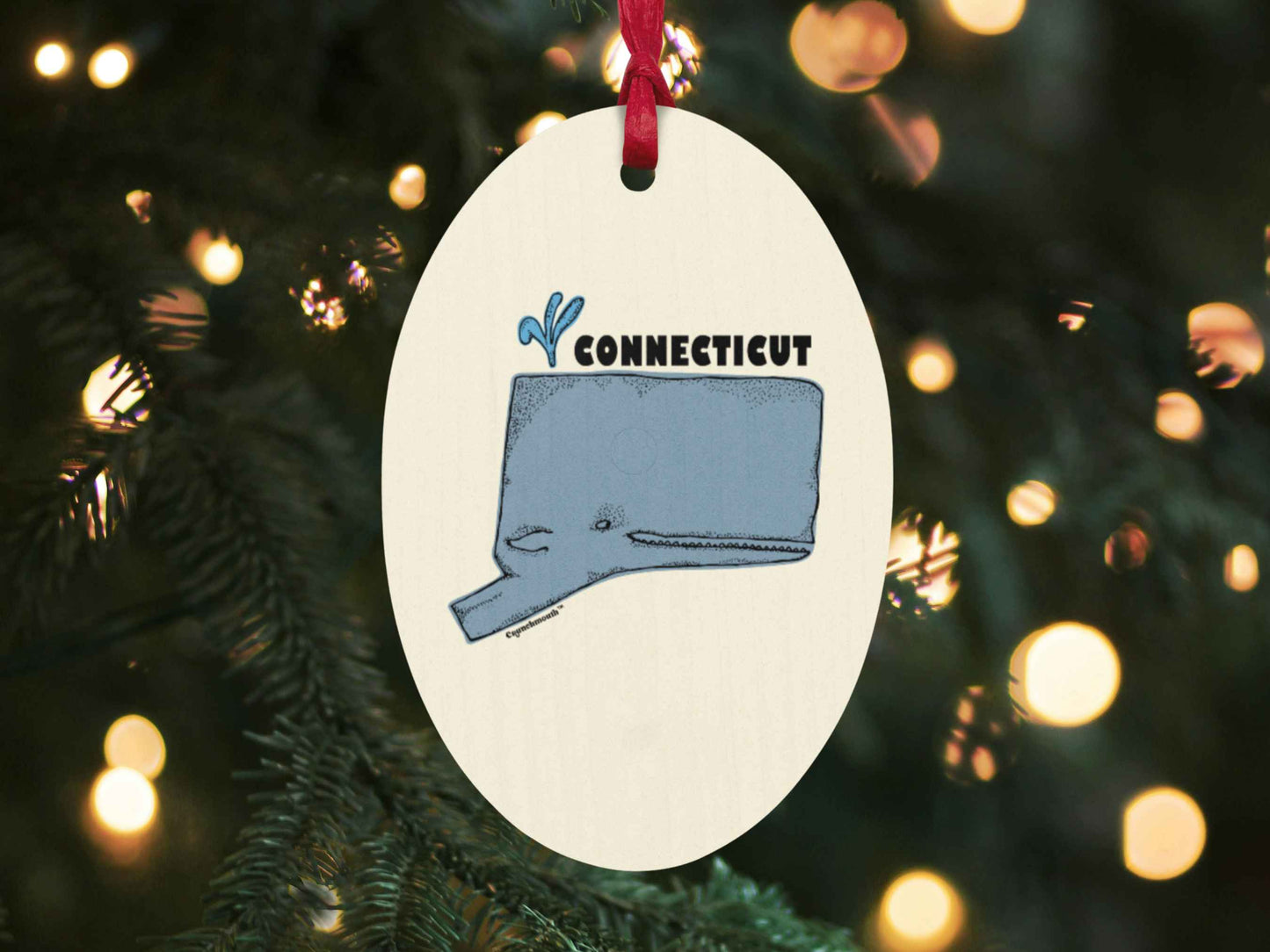 connecticut whale Christmas ornament, back, Christmas tree background