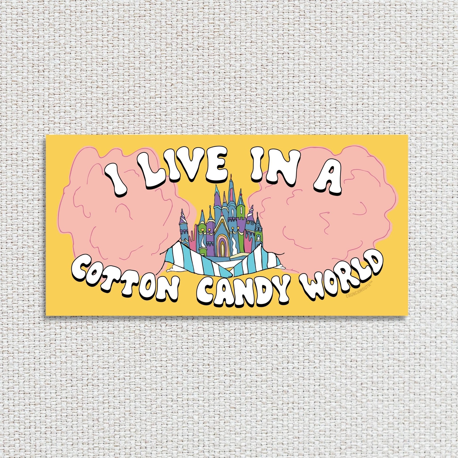 i live in a cotton candy world bumper sticker, textured fabric background