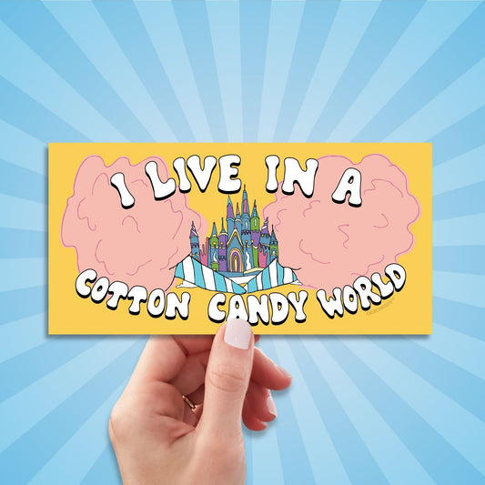 i live in a cotton candy world bumper sticker, hand display, sun rays design background