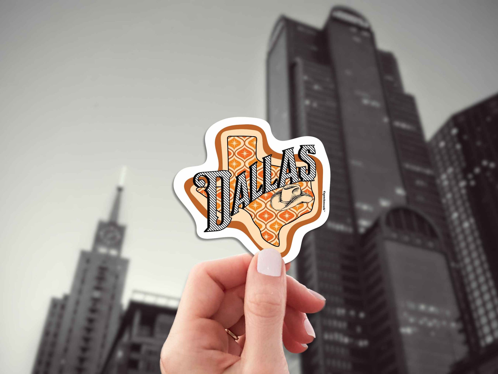 dallas travel luggage sticker, hand display, skyscraper background