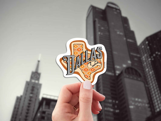 dallas travel luggage sticker, hand display, skyscraper background